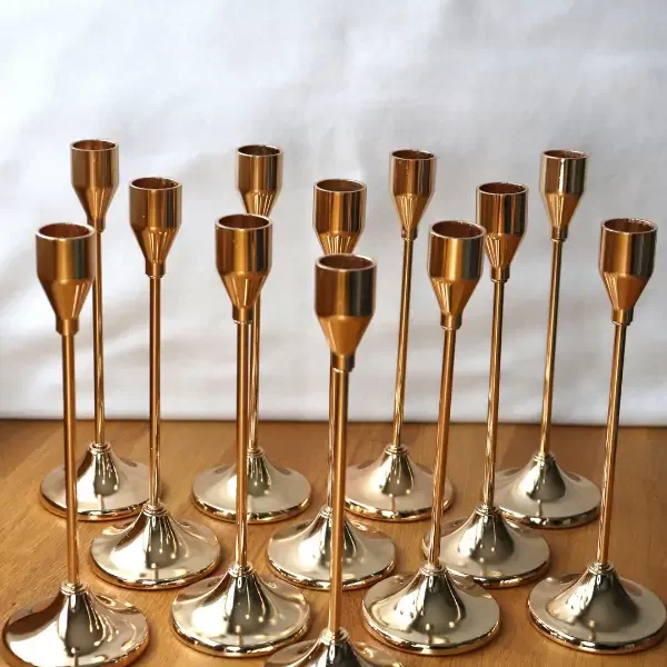 Lot de bougeoirs en métal or rosé